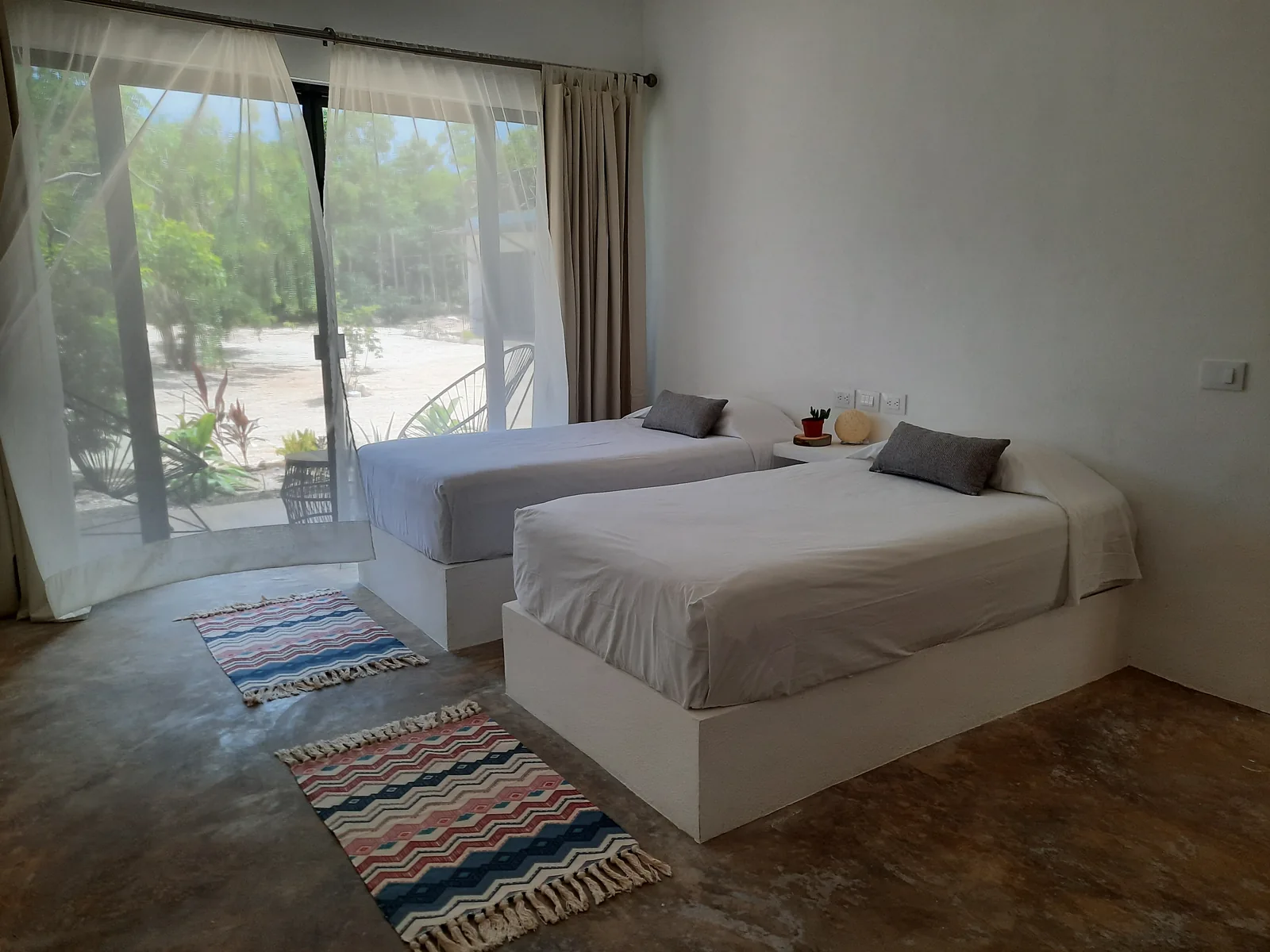 A bedroom with twin beds
