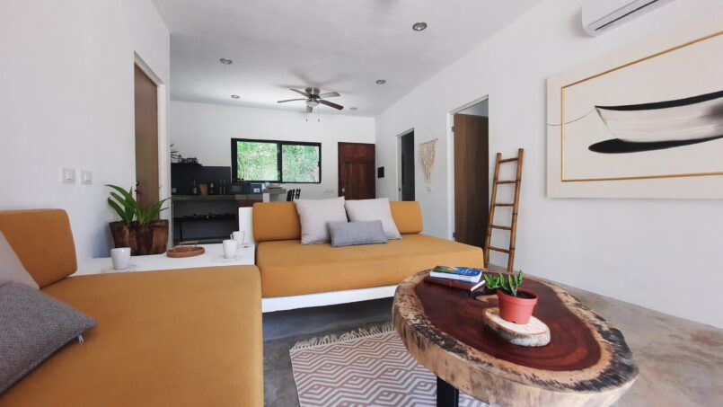 Bright one-bedroom living area at ARKAH