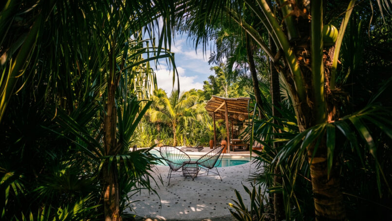 ARKAH cenote-inspired pool and pergola in the jungle